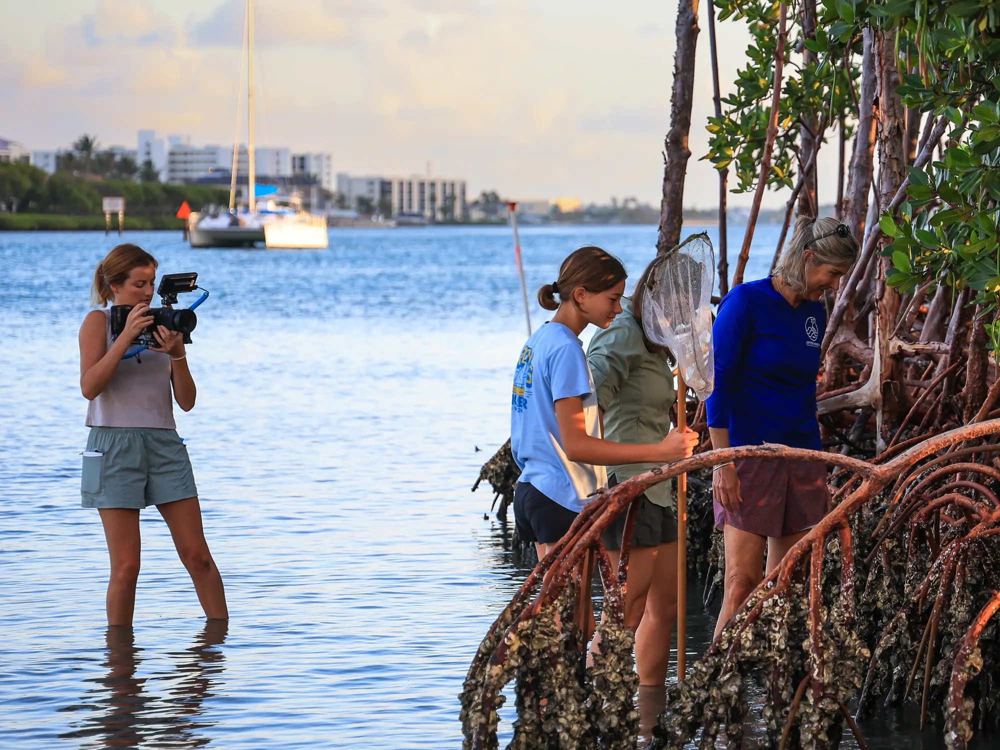 Wavelength crew filming on location in the mangroves