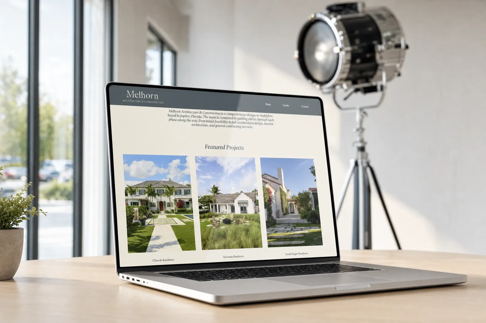 A custom Wavelength-built website shown on a laptop in a bright studio